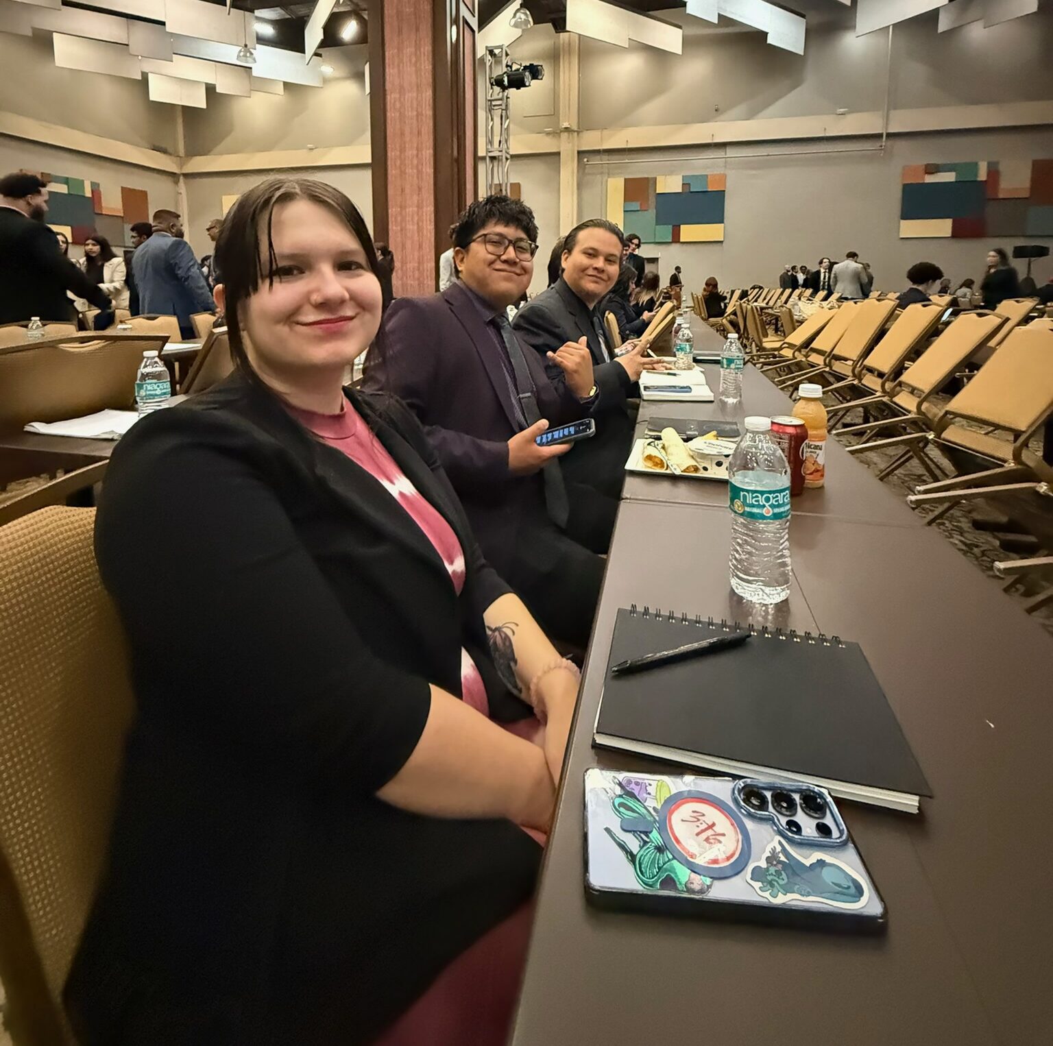 Spark Marketing team members networking during a company gathering
