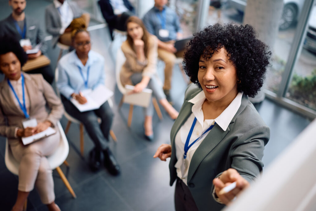 An instructor teaching leadership techniques to students